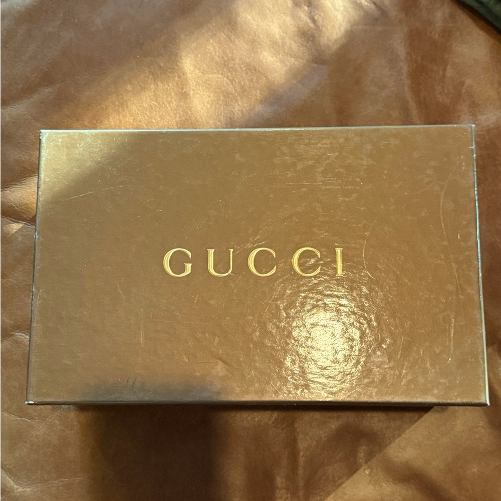Wine colored Gucci heels.